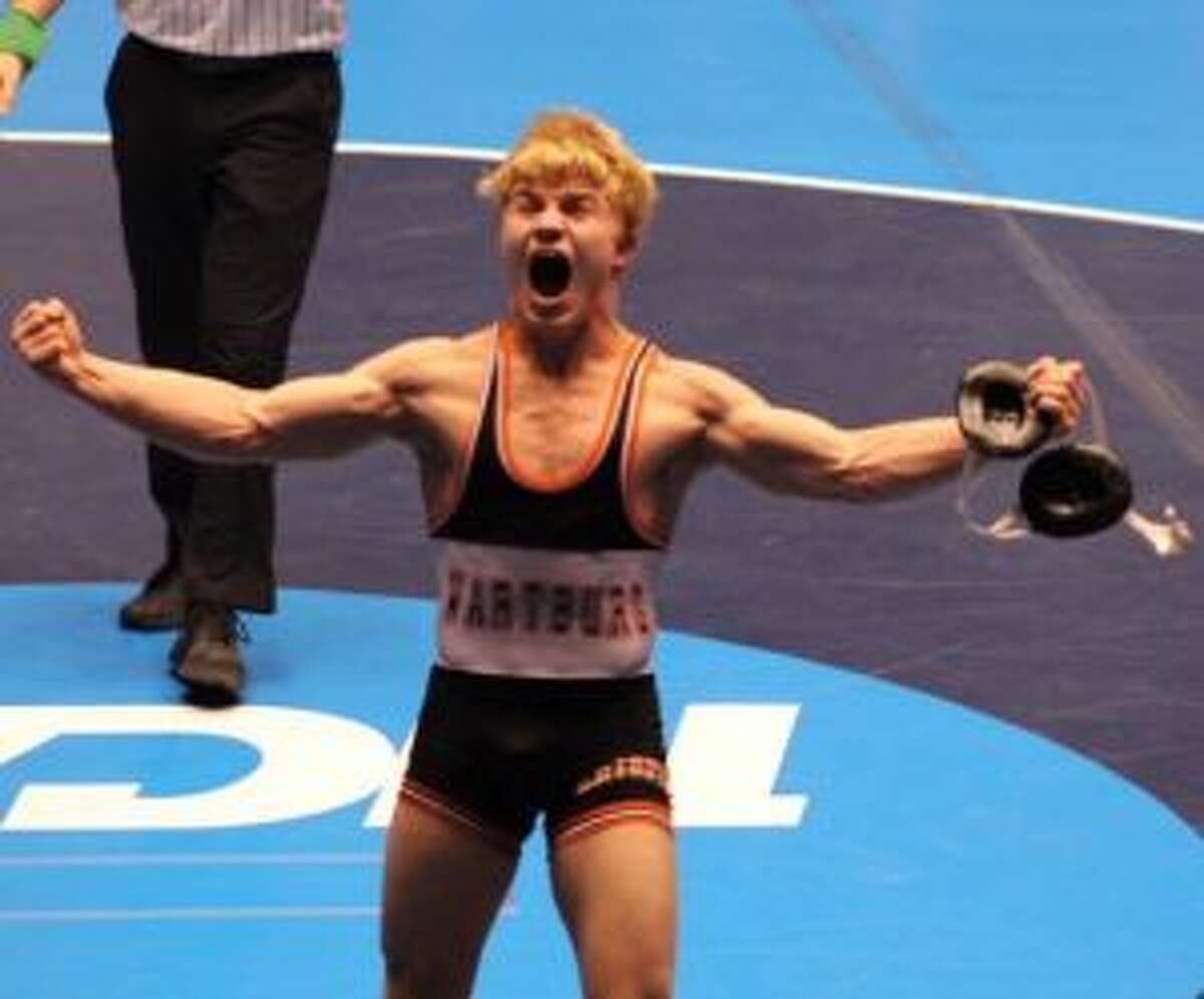 Cross Cannone celebrates after winning the NCAA Division III wrestling title at 149 pounds.