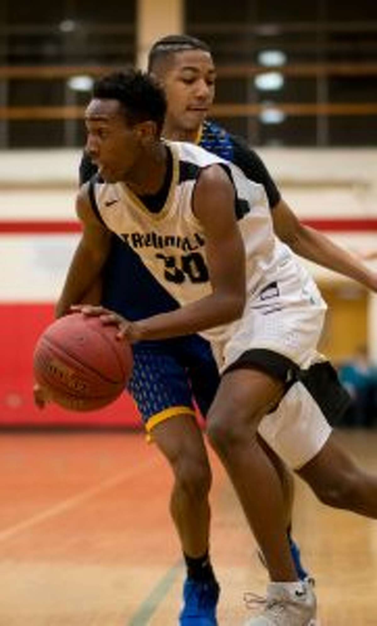 Timmond Williams made four 3-pointers and scored 27 points in the win over Darien. — David G. Whitham photo