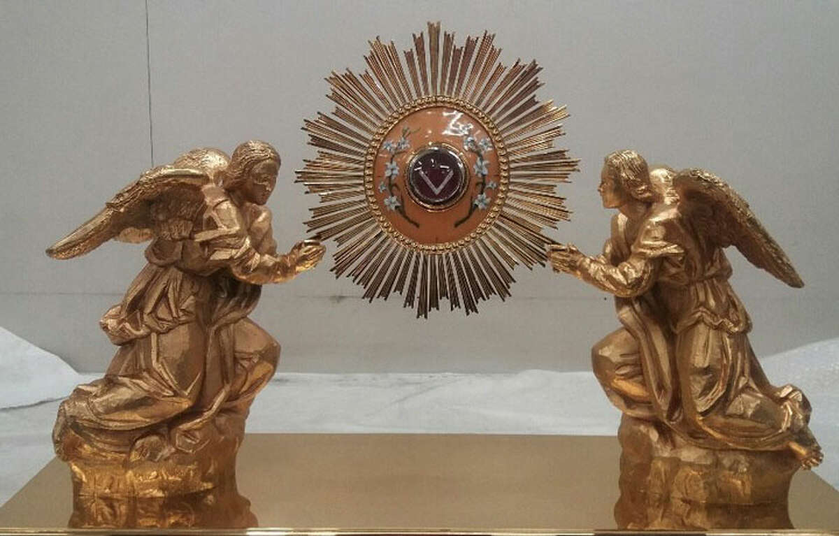 Artisans at Talleres de Arte Granda in Madrid, Spain, have completed the reliquary which will be placed inside the new altar in the church, so it will be visible from the body of the church.At the center of the sunburst held by the angels is an authenticated piece of bone from the earthy remains of Saint Catherine of Siena, our patroness, who died in Rome on April 29, 1380.