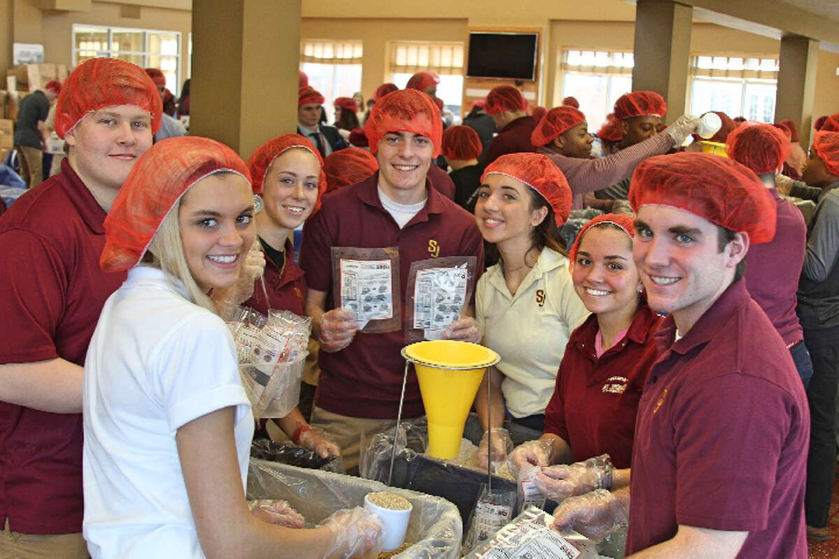 St. Joseph students recently celebrated the feast day of the school's patron saint by packing 24,000 meals for people living in the African nation of Burkina Faso.