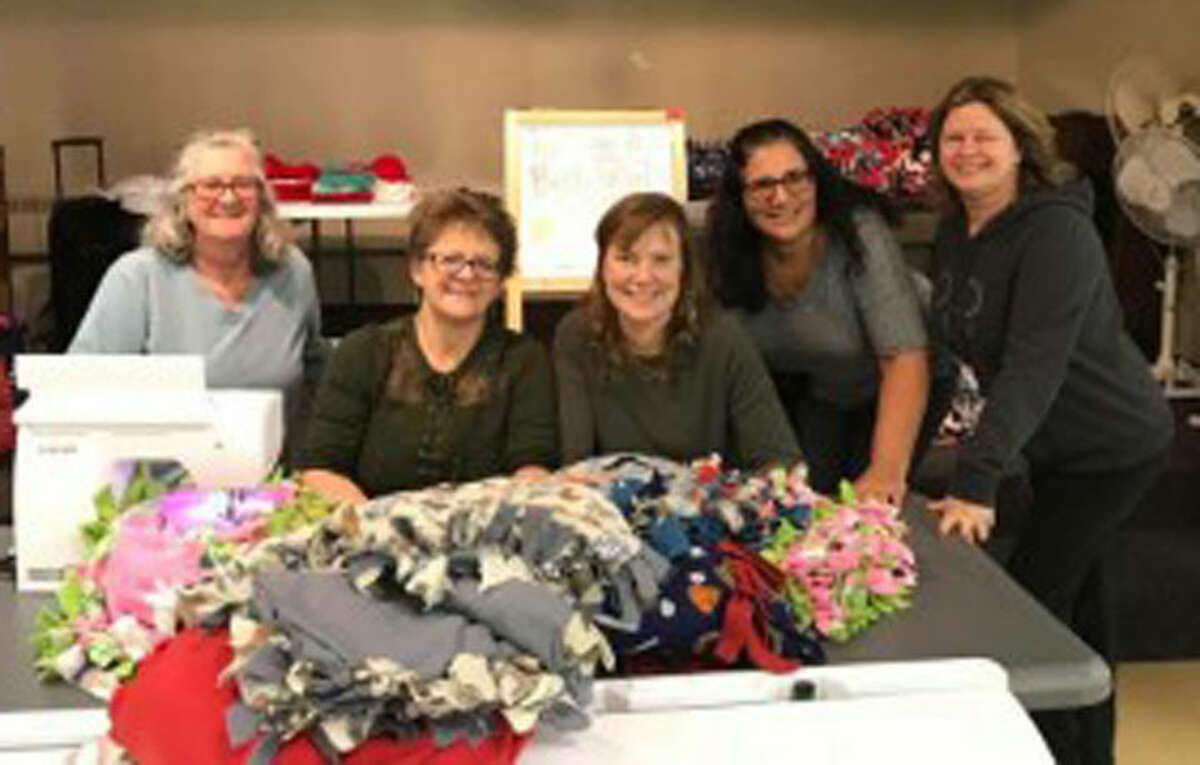 The Monroe/Trumbull chapter of Binky Patrol has joined forces with CT-NOW to make purple shawls for victims of domestic abuse.
