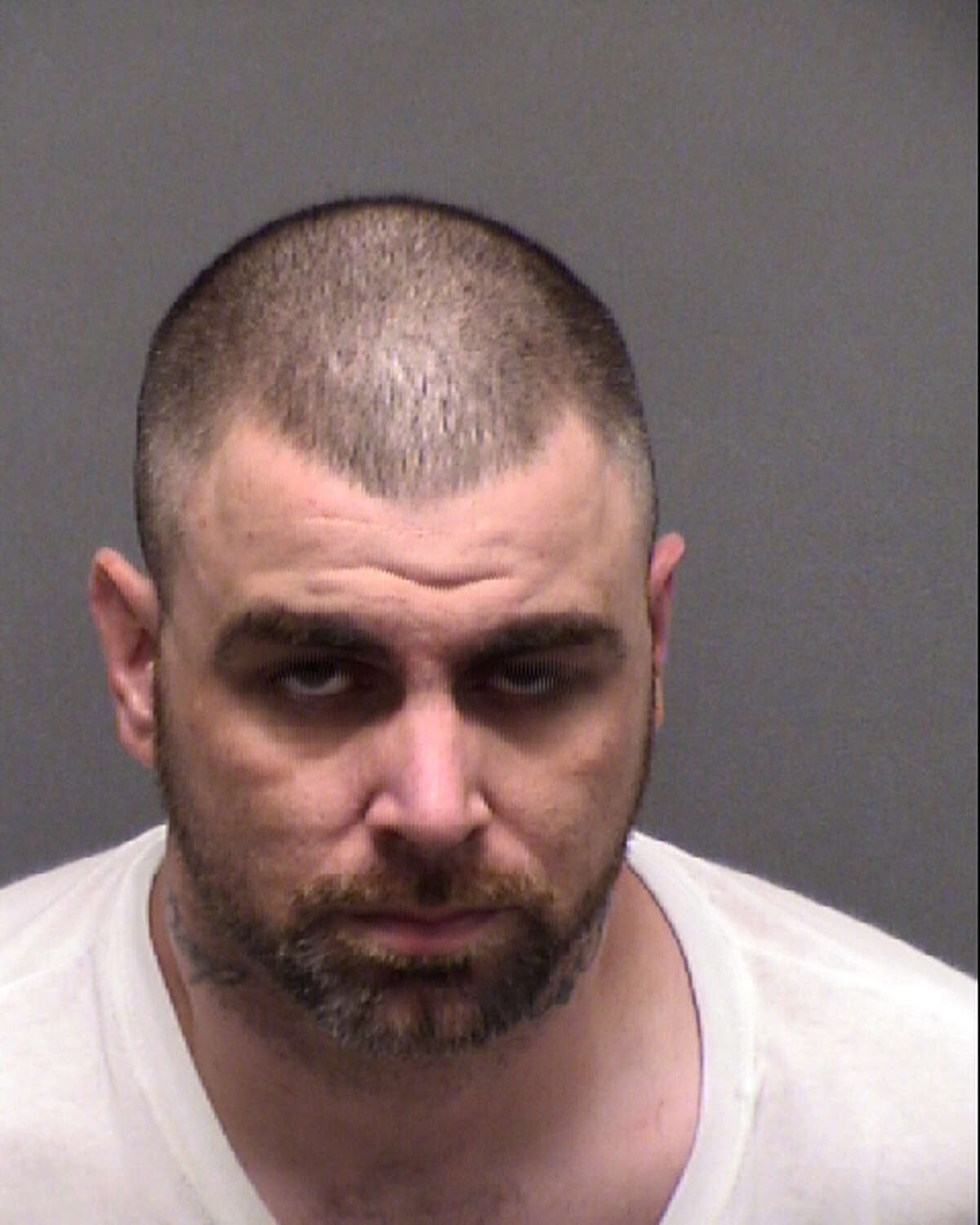 Jacob Corby, 32, was arrested after an officer-involved shooting at a Northwest Side motel on June 3, 2019. Corby is accused of backing into San Antonio police officers with a stolen car.