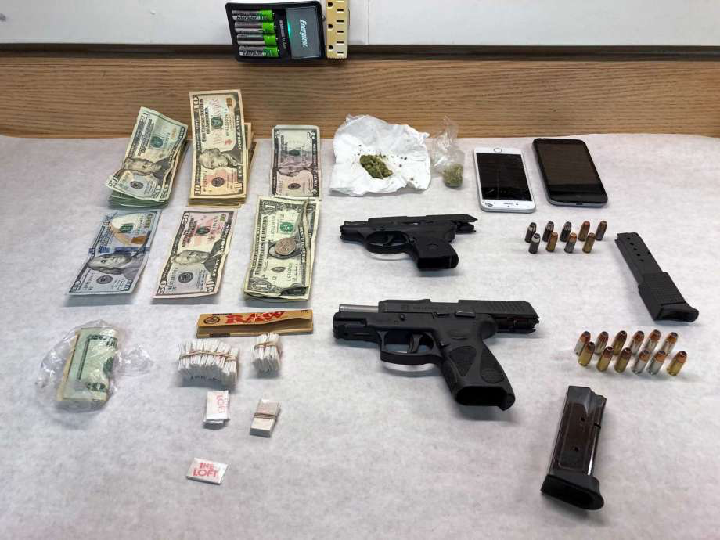Police seize guns, 80 bags of heroin during traffic stop on Old Town Road