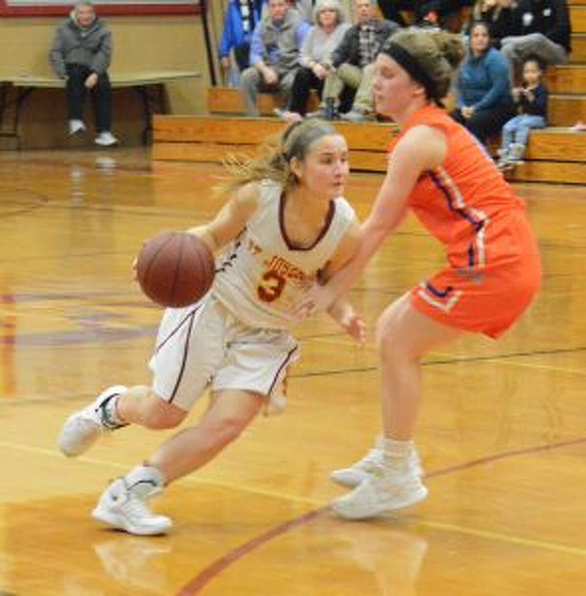Kathryn Zito drives past a Danbury defender. - Andy Hutchison photo