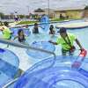 Laredoans enjoy tubing, sliding and the pool on Saturday, June 1, 2019, during the opening of Sisters of Mercy Water Park.