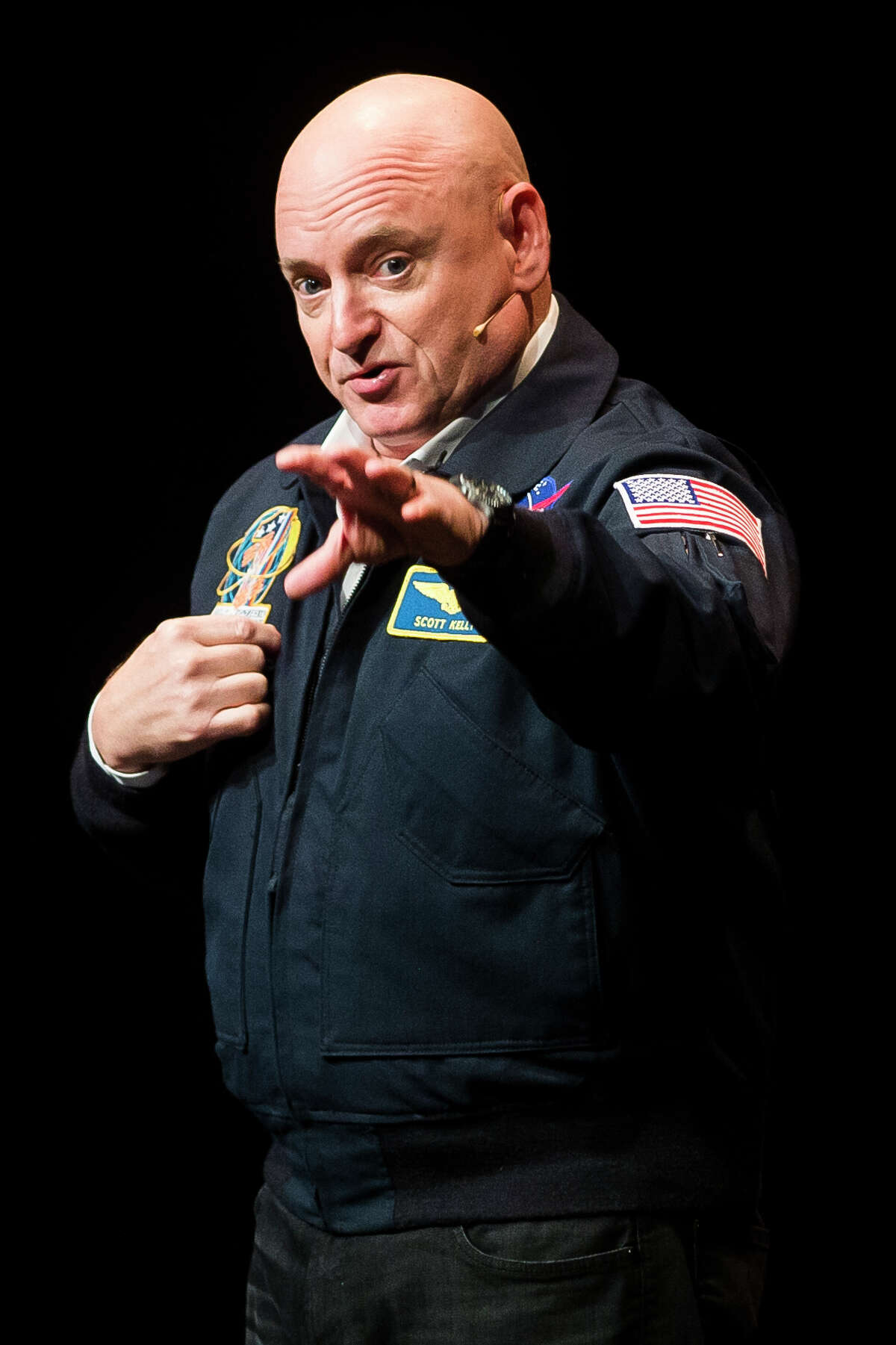 Captain Scott Kelly speaks in front of a packed auditorium during the Matrix:Midland festival on Tuesday, June 4, 2019 at the Midland Center for the Arts. (Katy Kildee/kkildee@mdn.net)