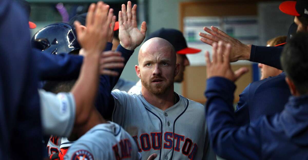 SEATTLE, WASHINGTON - JUNE 04: Derek Fisher #21 celebrates after scoring off a double hit by Alex Bregman #2 of the Houston Astros in the fifth inning against the Seattle Mariners during their game at T-Mobile Park on June 04, 2019 in Seattle, Washington. (Photo by Abbie Parr/Getty Images)