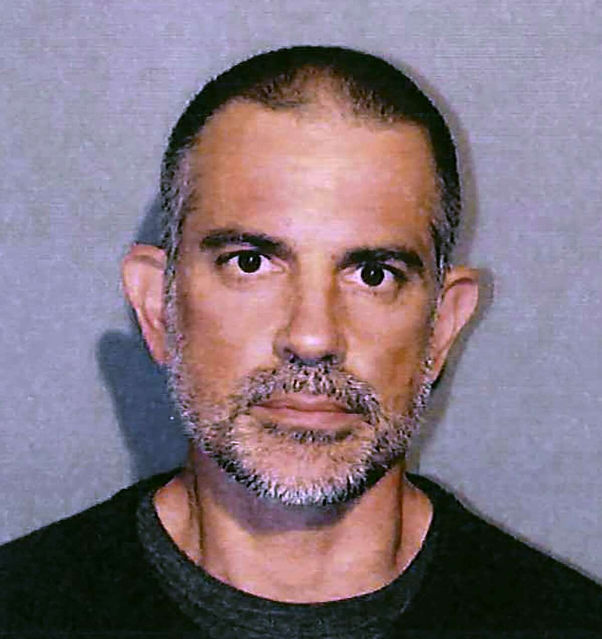 This photo provided by the New Canaan Police Department shows Fotis Dulos. Police in Connecticut have arrested a missing mother of five's estranged husband and his girlfriend on charges of evidence tampering and hindering prosecution. New Canaan authorities announced Sunday, June 2, 2019, the arrests of 51-year-old Dulos and 44-year-old Michelle C. Troconis. Both were detained on $500,000 bail and are scheduled to be arraigned Monday in Norwalk Superior Court. Details of the allegations were not released. (New Canaan Police Department via AP)