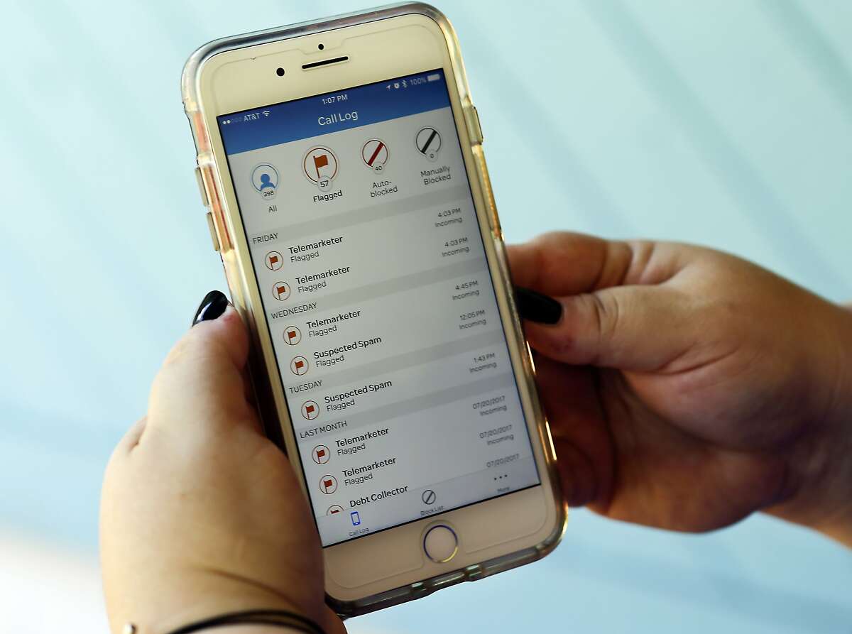 FILE - This Aug. 1, 2017, file photo, shows a call log displayed via an AT&T app on a cellphone in Orlando, Fla. New tools are coming to help fight robocall scams, but don’t expect unwanted calls to disappear. (AP Photo/John Raoux, File)