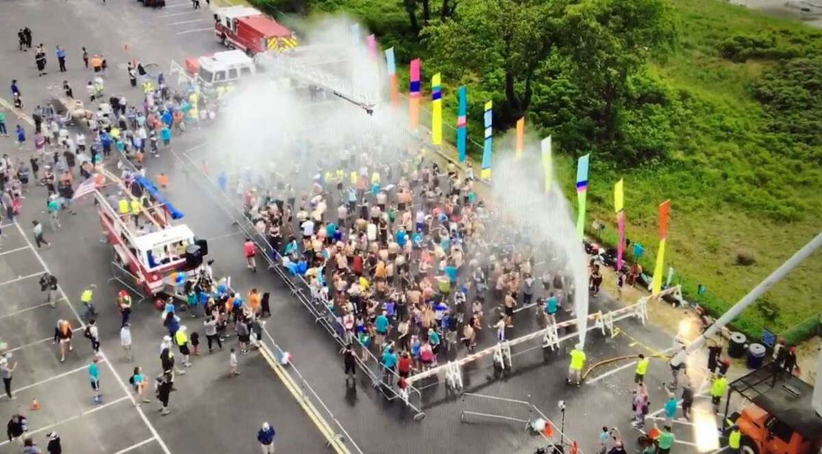 Drone footage from the Fairfield Fire Dept. showing the Fairfield Road Races' effort to break a Guinness World Record for most people showering simultaneously in one venue.