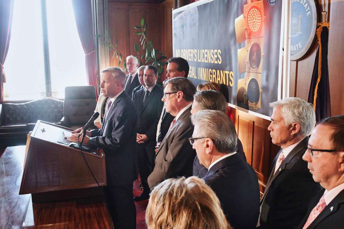 Senator Chris Jacobs, left, surrounded by his fellow Republicans, expresses his opposition to legislation that would provide illegal immigrants with New York driver’s licenses during a press conference on Wednesday, June 5, 2019, in Albany, N.Y. (Paul Buckowski/Times Union)