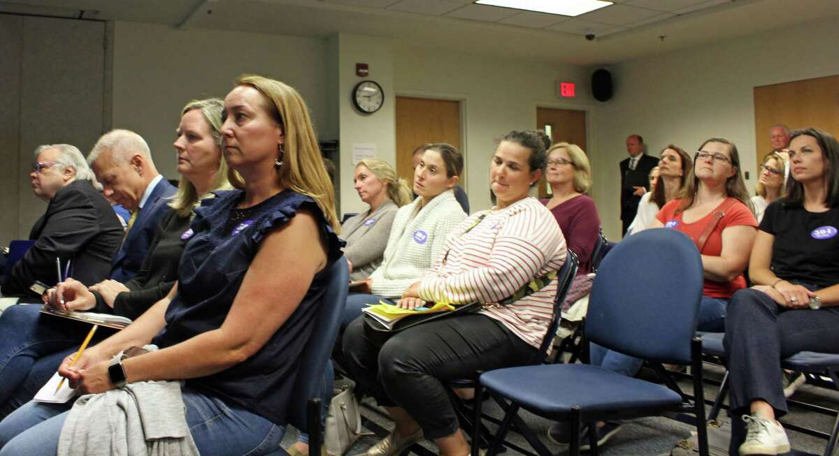Over 50 parents attended a Board of Finance meeting June 4 that saw the board approve funding for a 441-student Mill Hill School.