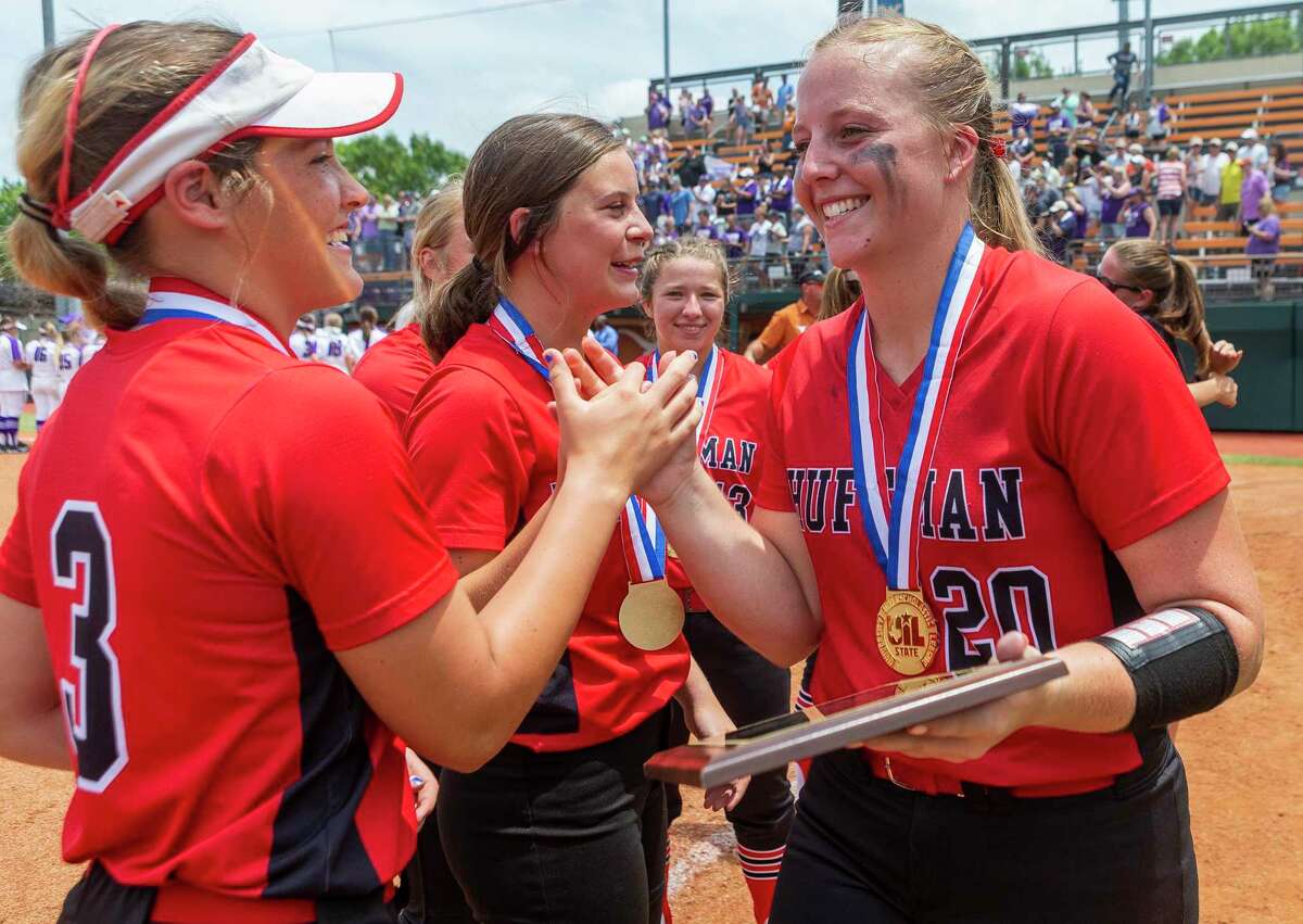 Huffman Hargrave pitcher Katy Janes (20) celebrates her MVP award with Tiegan Boyd (3) after a 12-0 win in six innings over Anna during the UIL Class 4A state softball championship in Austin, Saturday, June 1, 2019. (Stephen Spillman / for Houston Chronicle)