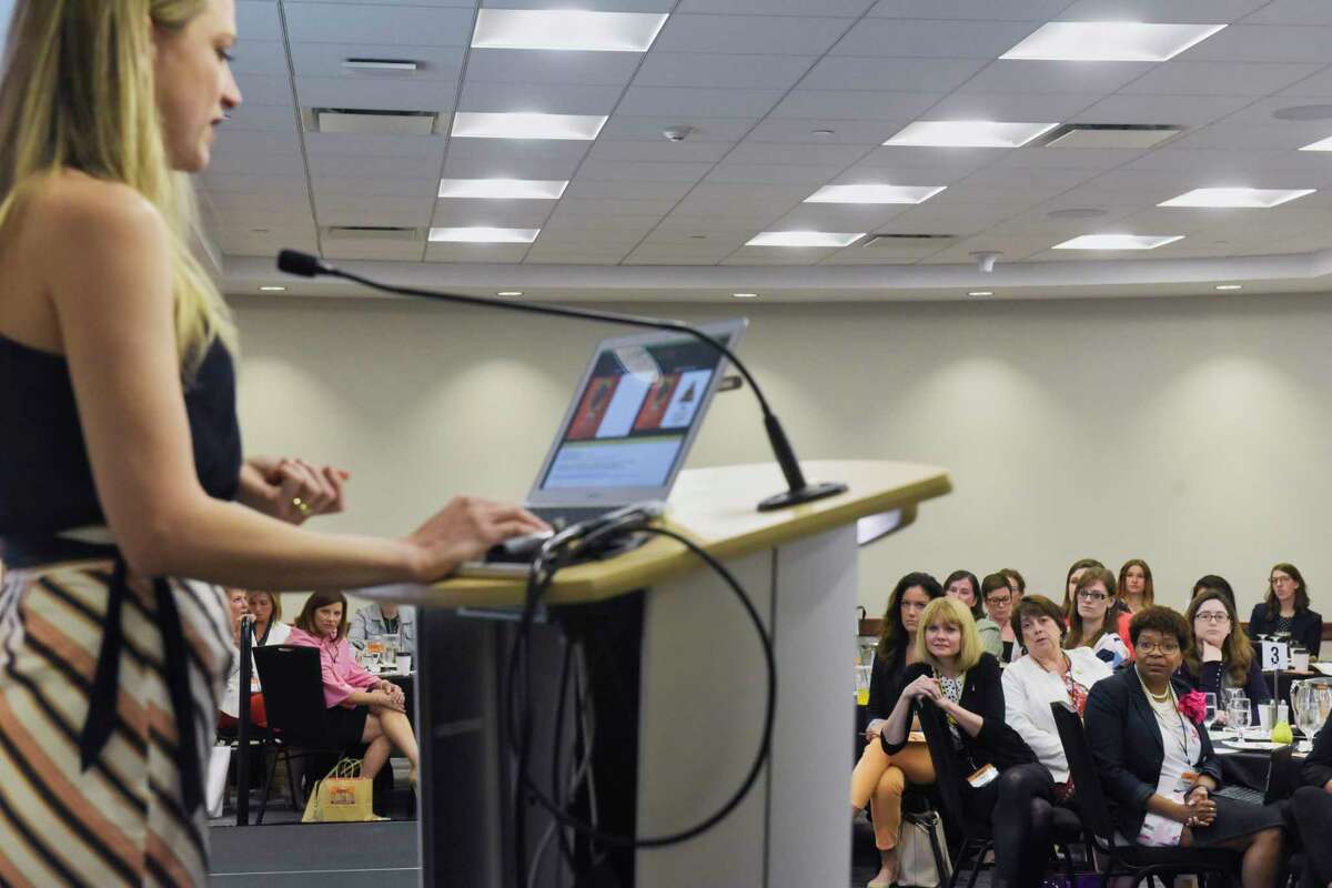 Women listen as Lisa Burton, executive director of HearstLab delivers the keynote address at the Women@Work 3rd annual Summit at the Hearst Media Center on Wednesday, June 5, 2019, in Colonie, N.Y. (Paul Buckowski/Times Union)