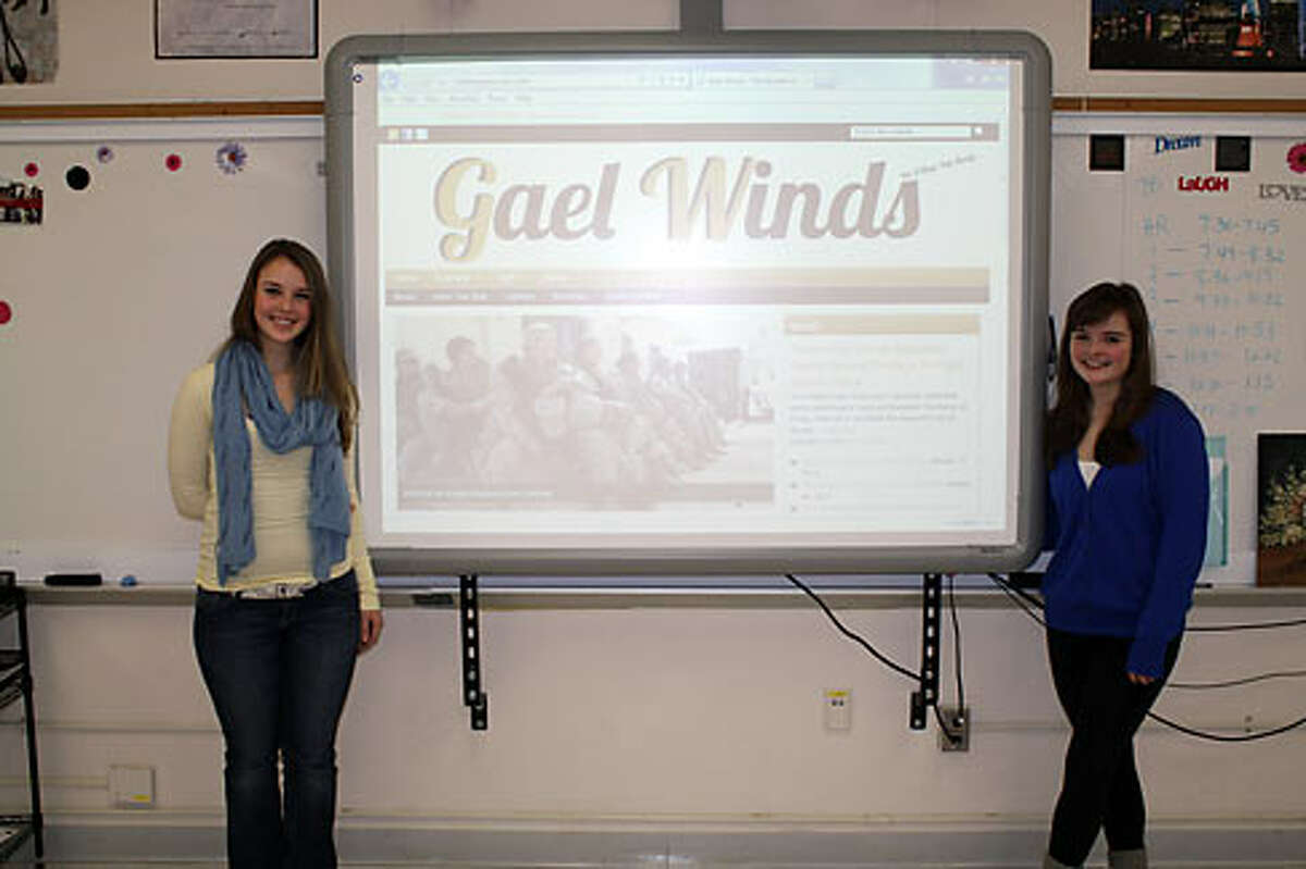 Gael Winds editors Kristen Grabarz and Colette Harley show off the new website. — Lynn Coffin photo