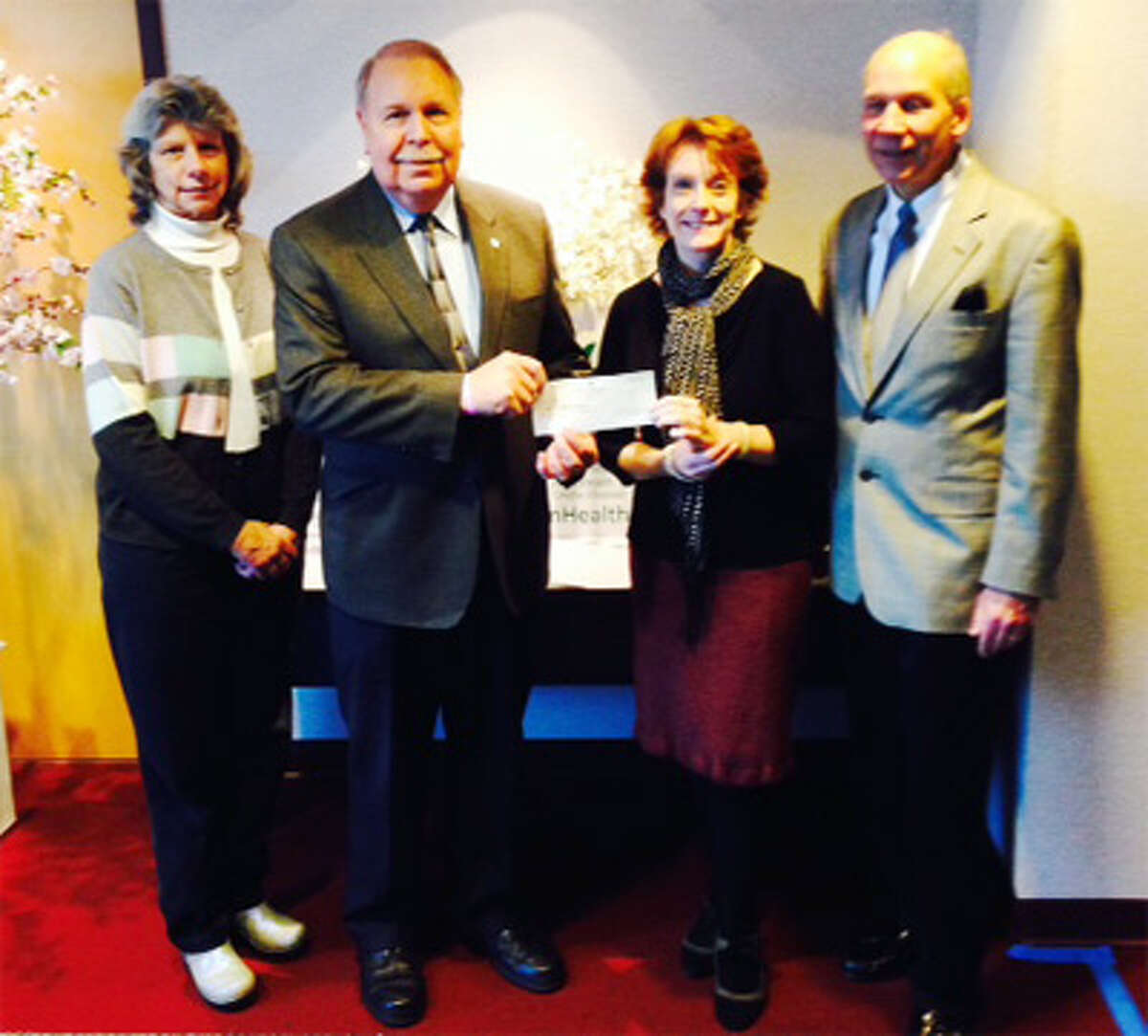 At the check presentation ceremony are, from left, Janet Hall, Griffin Hospital senior development officer of corporate and foundation relations; Larry Holderman, Mutual Security Credit Union president and CEO; Connie Evans, Griffin Hospital development executive director; and Bill Purcell, Greater Valley Chamber of Commerce president.