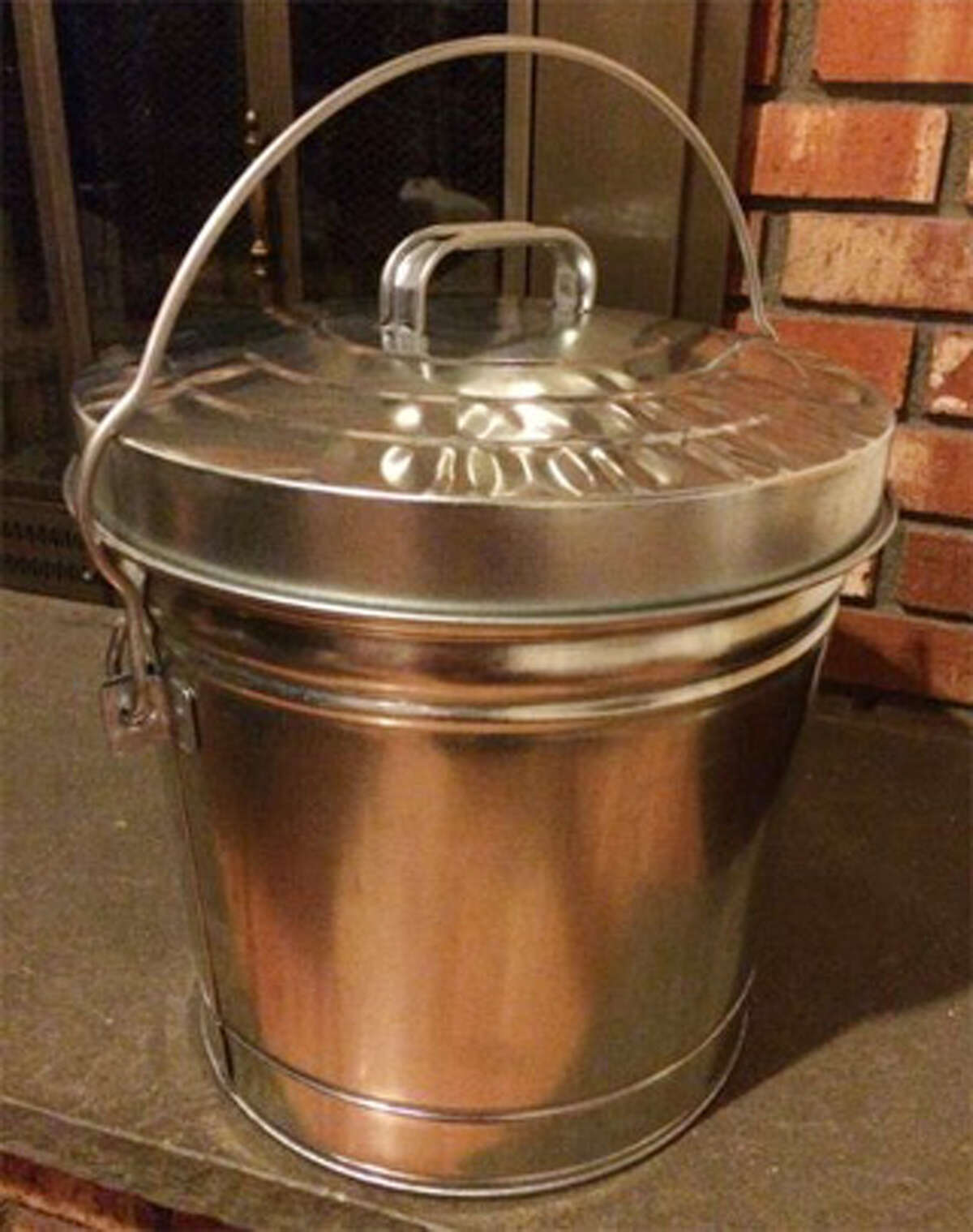 This is a proper container for removing and storing ashes from fireplaces and wood stoves.