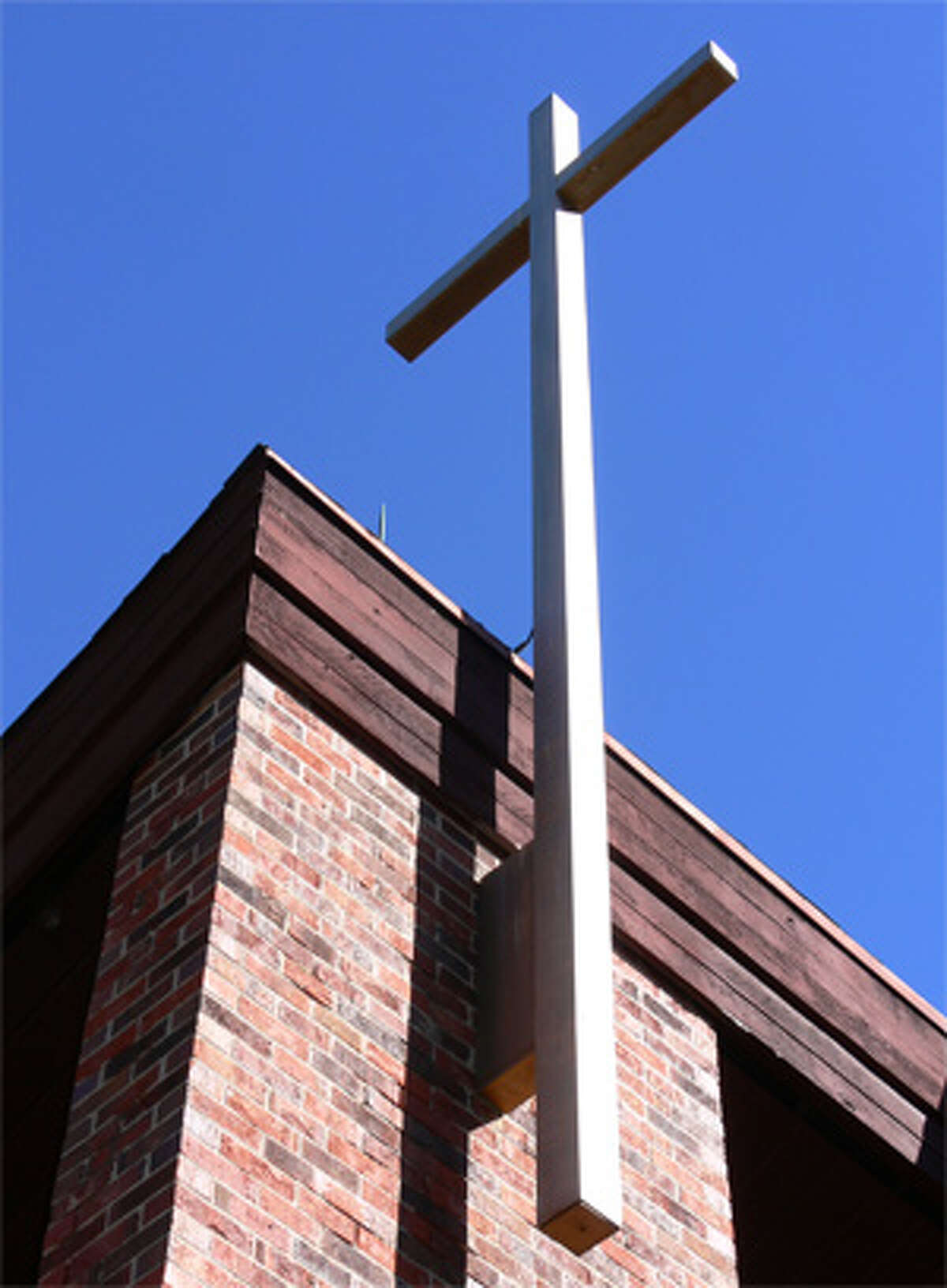 The cross on top of St. Margaret Mary Church in Shelton.