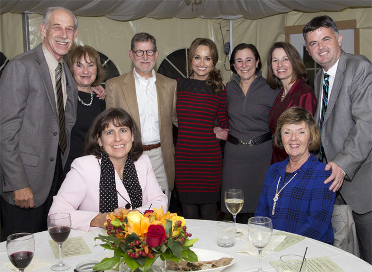 Among the hospital officials and guests on hand for “An Evening with Giada” were, from left, standing, Dr. Robert Folman, co-medical director of the Norma F. Pfriem Cancer Institute, and his wife, Toby; Dr. Richard Freedman, neonatologist; celebrity chef Giada De Laurentiis; Dr. Freedman’s wife, Nancy; MaryEllen Kosturko, senior vice president of patient care operations; and Marc Brunetti, vice president of administration. Seated are Lyn Salsgiver, senior vice president of planning and marketing; and Brunetti’s mother, Anne.