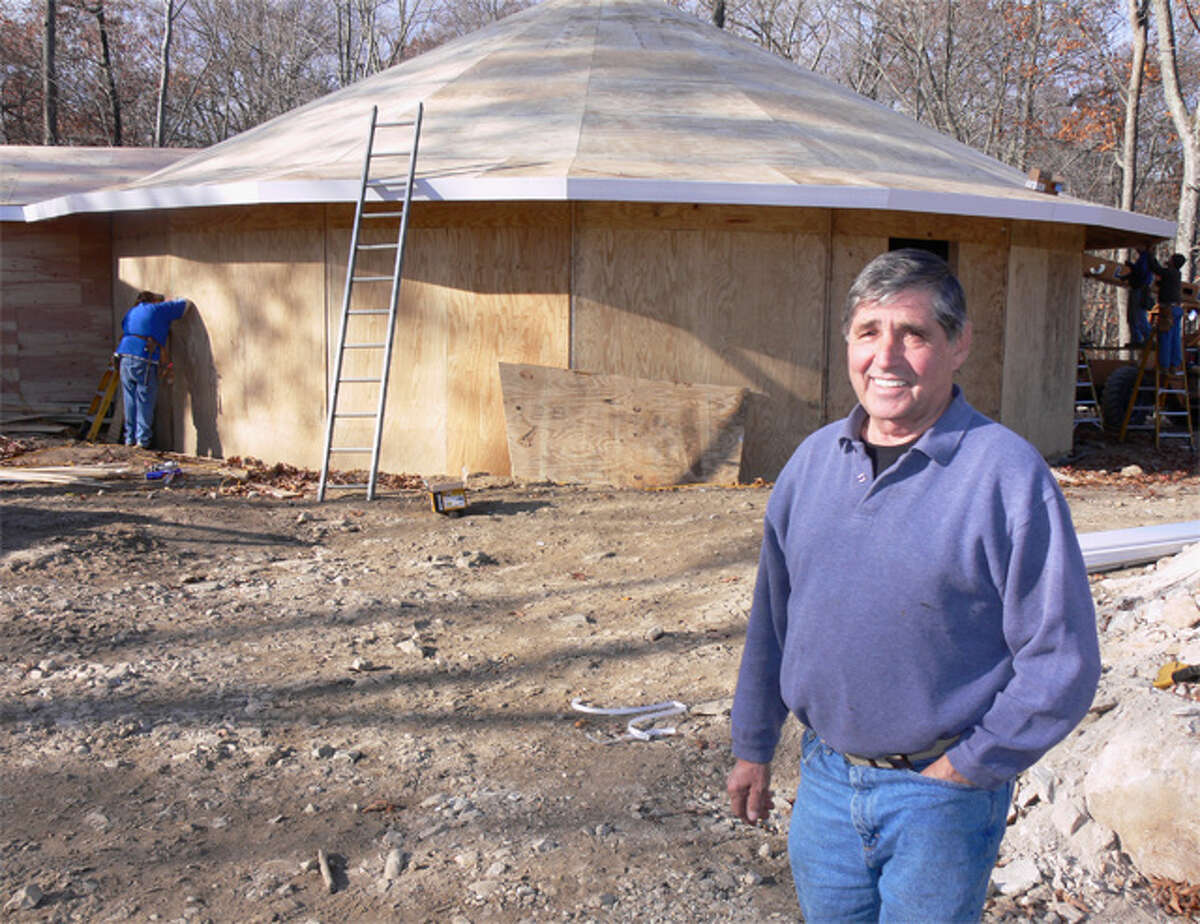 Shelton contractor Yvon Rodrigue is building a round house for a client on Nells Rock Road. “It will be very unique around here,” he said of the structure’s shape.