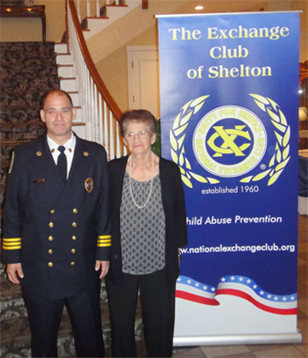 White Hills Assistant Fire Chief Edward Tevolitz with his mother at a state Exchange Club ceremony honoring his service last fall.