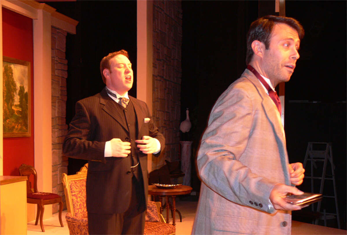 Marc Improta, right (in gray jacket), and Brett Boles perform in “The Importance of Being Earnest” at Center Stage Theatre. Improta grew up in Shelton and now lives in New York City, and Boles is from Newtown.