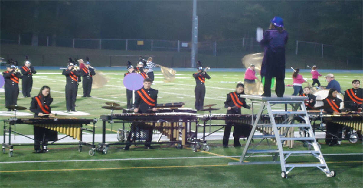 The Shelton High School marching band and colorguard at a previous event.