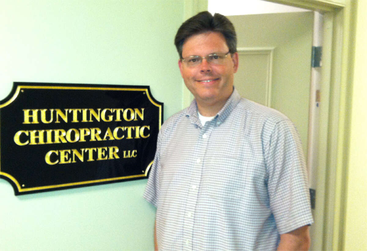 Dr. John H. Litts Jr., a chiropractor with the Huntington Chiropractic Center, at his new office on Trap Falls Road in Shelton.