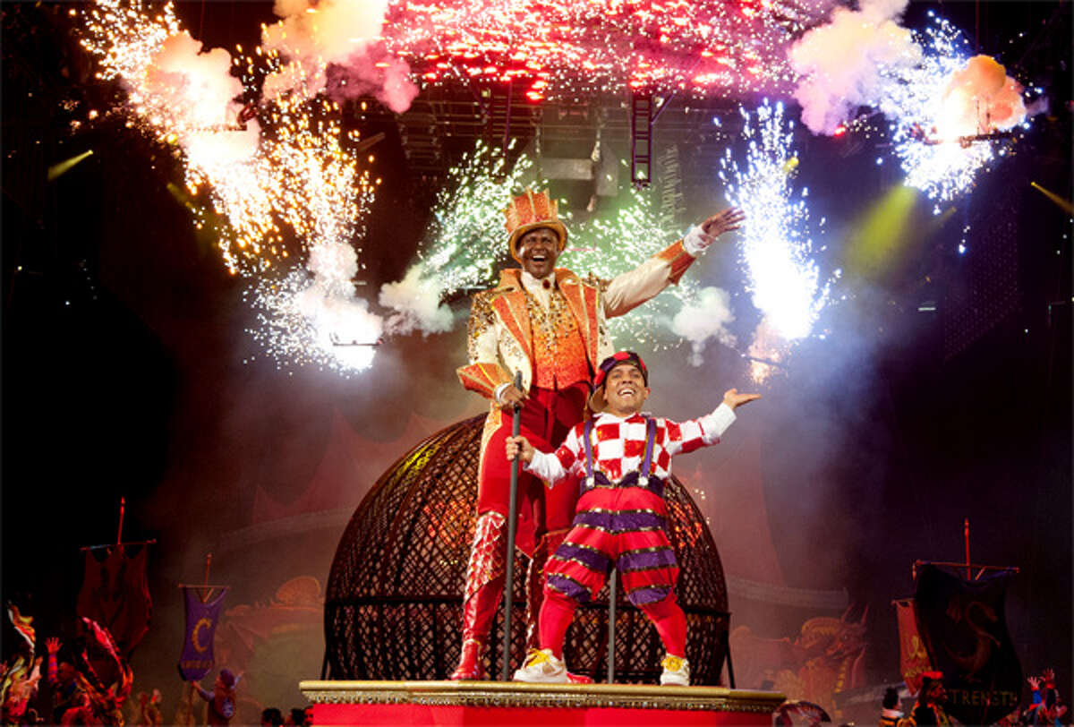 Ringling Bros. and Barnum & Bailey Circus Ringmaster Johnathan Lee Iverson, who is a University of Hartford graduate, with his sidekick Paulo dos Santos during a performance.