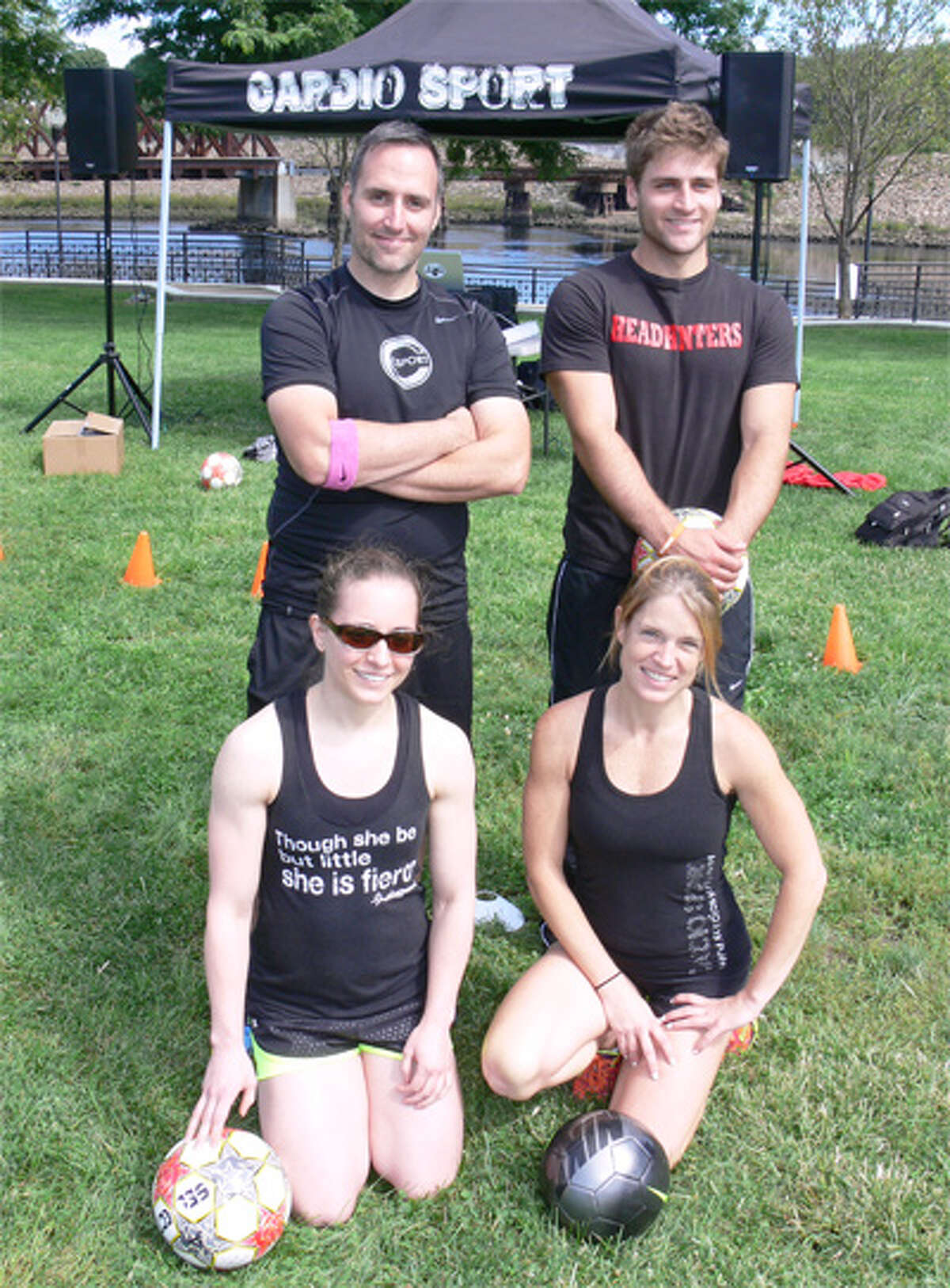 Representing CardioSport at the event were, from left, kneeling, Jacelyn Rhoads and Sharon Werth; standing, John Duffy and Shelton resident Rob Lumento. CardioSport offers sports and fitness training at B&B Batting Cages in Shelton.