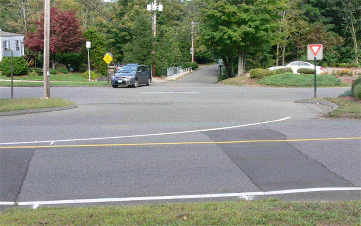 This shows where a crosswalk might be built across Church Street and Huntington Street so people parking at the Shelton Community Center could get to the Shelton Lakes Recreation Path entrance on Lane Street (pictured on the other side, with a vehicle pulling out).