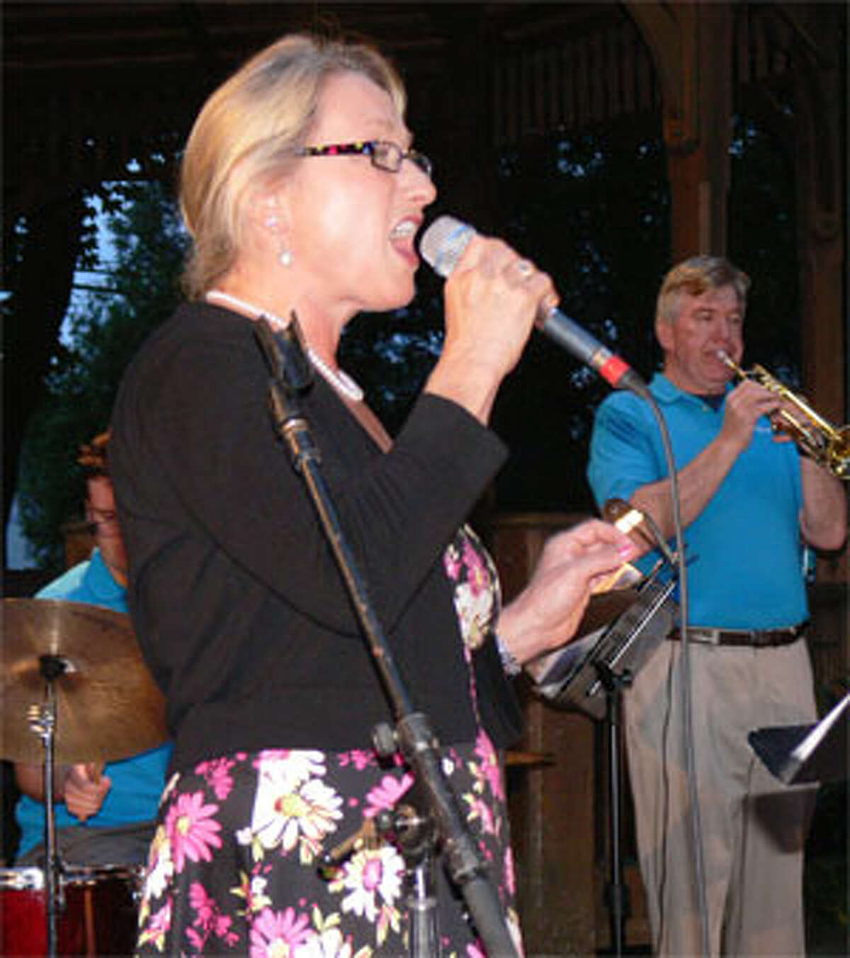 Vocalist Corinne Thurstan sings with the Little Big Band during the concert.