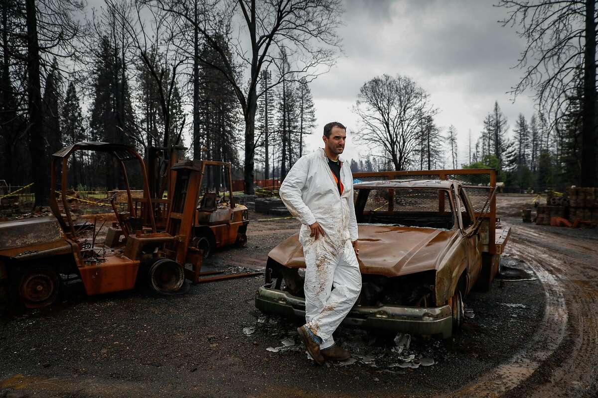 Luke Bellefeuille stands for a portrait while cleaning up a family friend's property that was destroyed during the Camp Fire in Paradise, California, on Wednesday, May 15, 2019. Luke works for PG&E and lost his house in the Camp Fire. He decided to take a leave of absence to help family and friends with property damage.