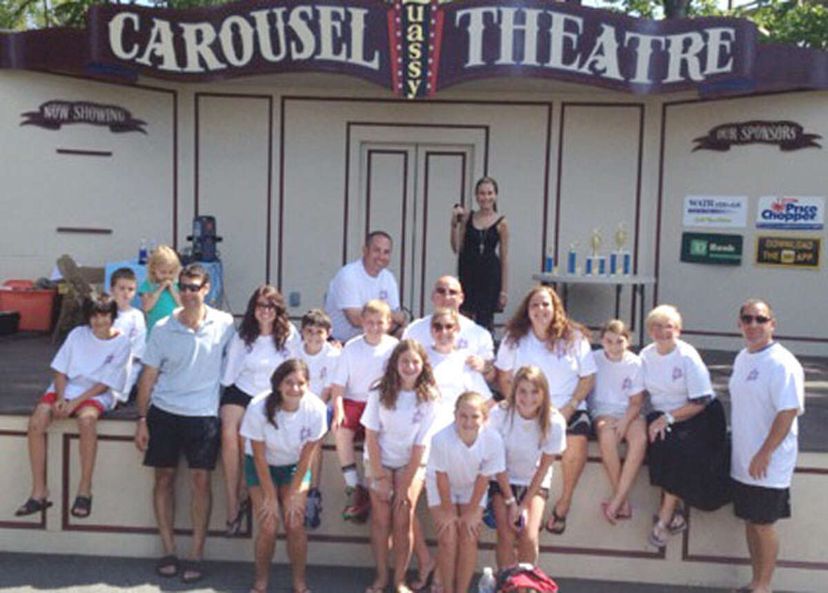 Margaret Blanco, wearing a black dress in the back, in a group shot during the Quassy Amusement Park singing contest.