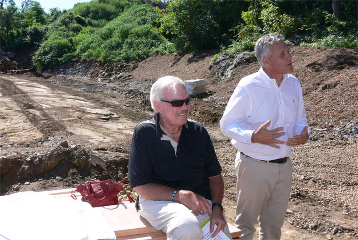 Gerry Craig, left, Animal Shelter Building Committee chairman, with Greg Raucci, owner of Bismark Construction, the company selected to construct the shelter.