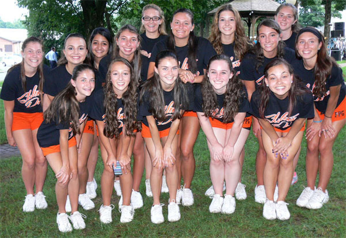 The Shelton High School Pom Pons pose at this week’s concert on the Huntington Green.