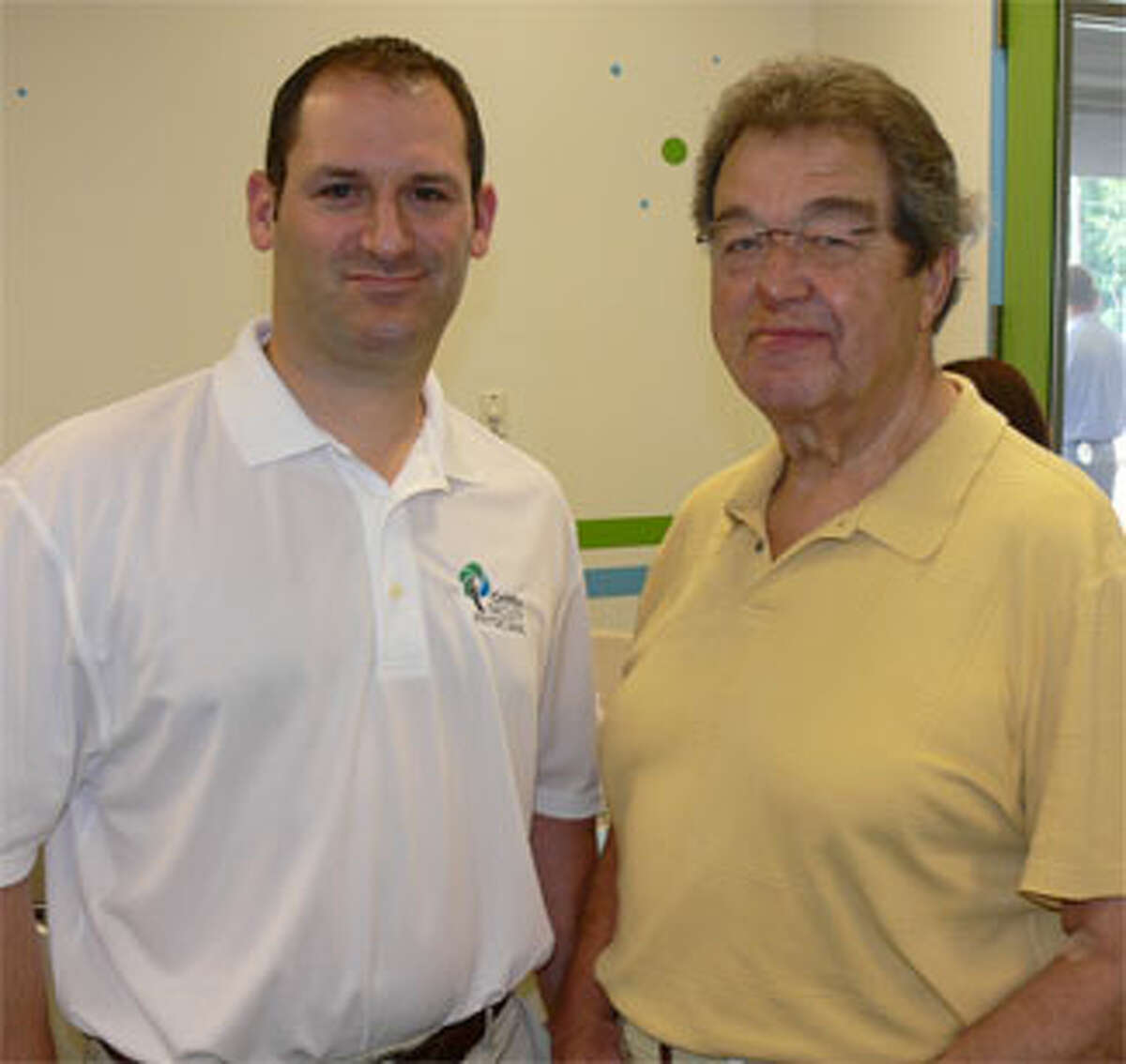 Dr. Brian Sperling, left, urologist with Griffin Faculty Physicians, and Francis H. Michaud, a CPA in Ansonia, who helped begin Griffin Hospital’s Health Initiative for Men.
