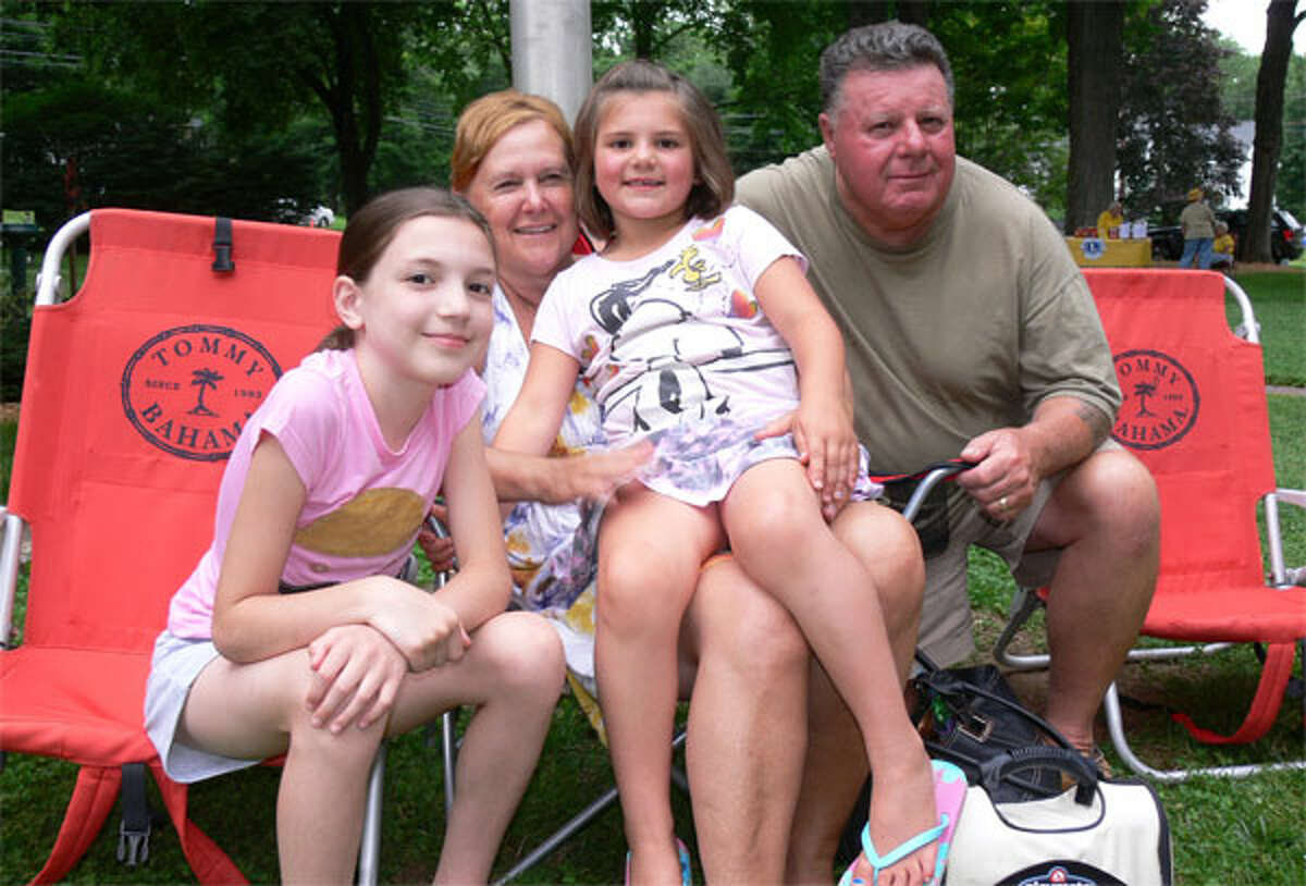 Getting ready for the initial concert on the green this summer are Janet and Nemetz with granddaughters, from left, Cora Welsh, 11, and Ella Welsh, 6, all of Shelton.