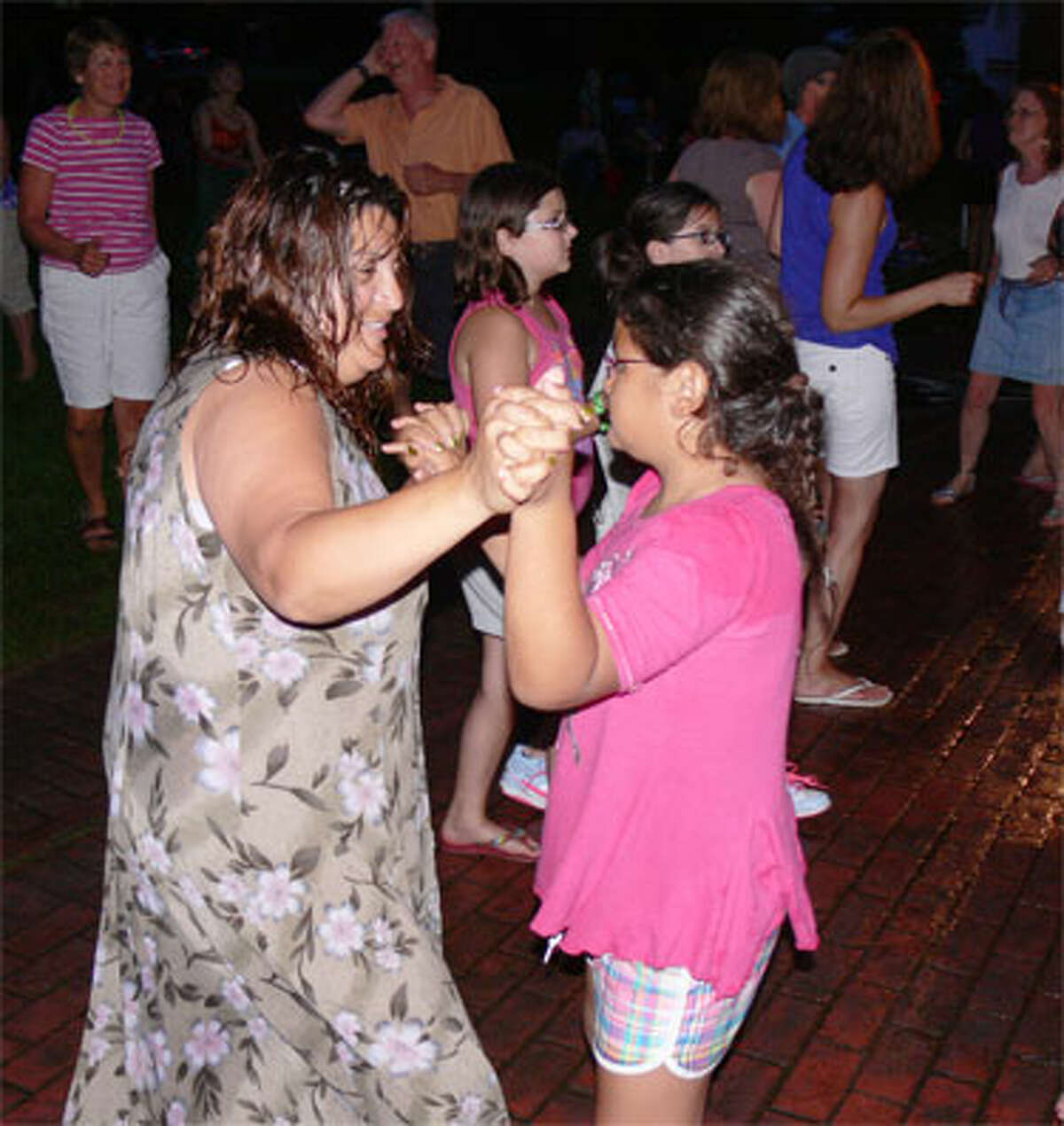 Many concert-goers began dancing in front of the gazebo as the night went on.