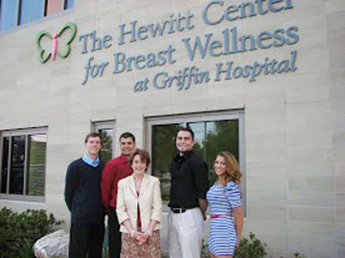 Presenting a donation from the Shelton High boys volleyball team to Griffin Hospital Development Fund Executive Director Cornelia Evans, center, are, from left, John Kocur, Michael Torres, Mac Thompson and Emma Hanrahan.