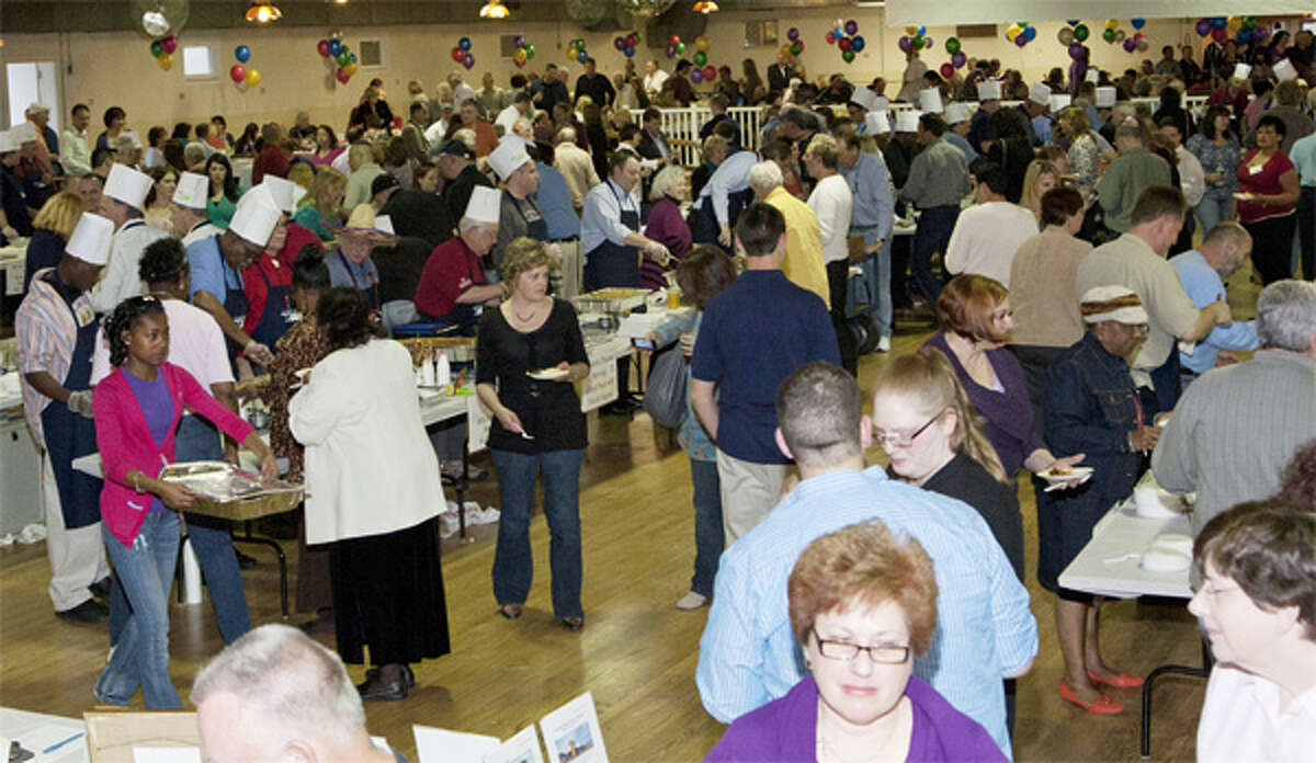 Attendees get to sample many different kinds of cuisine at the annual fund-raising event.