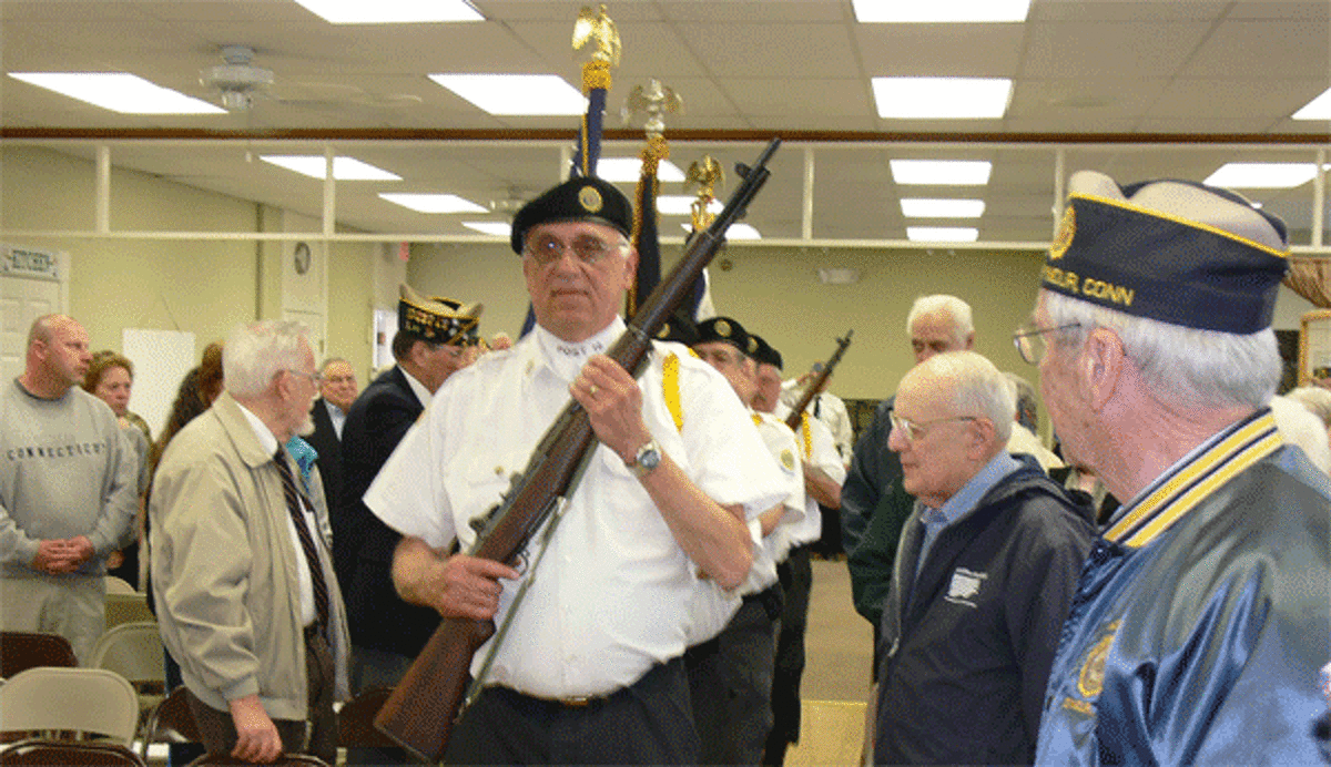 The color guard begins the ceremony at the Sutter-Terlizzi American Legion Post No. 16 in Shelton.
