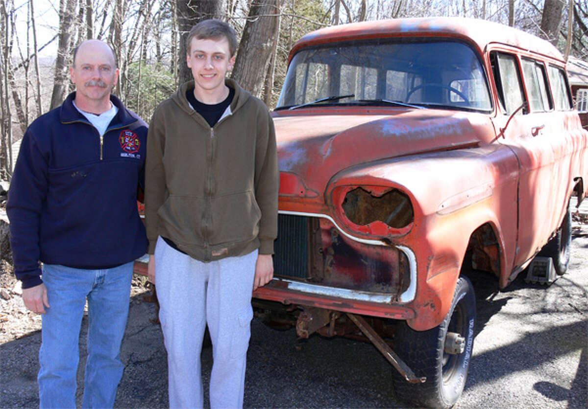 Daniel Tatun, who recently won a statewide auto-tech competition, and his father John plan to restore this 1959 Chevy Suburban.
