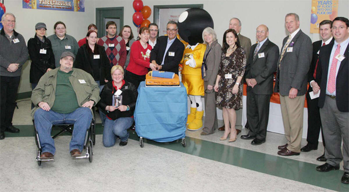 The winners of the design-a-lighter contest at the Milford BIC factory with company officials and local dignitaries, including Shelton Mayor Mark Lauretti (third from right).