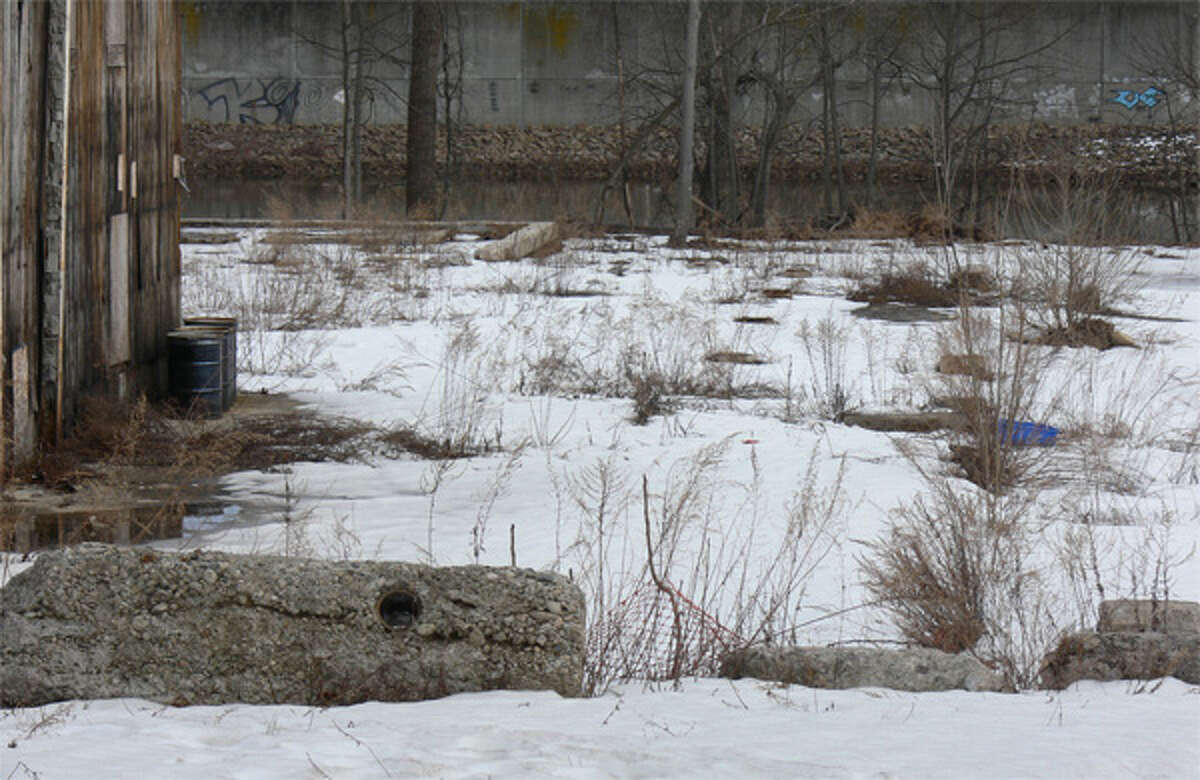 The Rolfite property on Canal Street, shown in the rear close to the Housatonic River, could become part of a downtown revitalization project just south of Bridge Street.