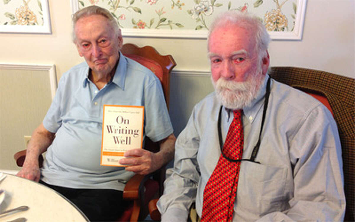 Crosby Commons resident Dick De Witt, left, spends time with Mike Daly, editorial page editor of the Connecticut Post.
