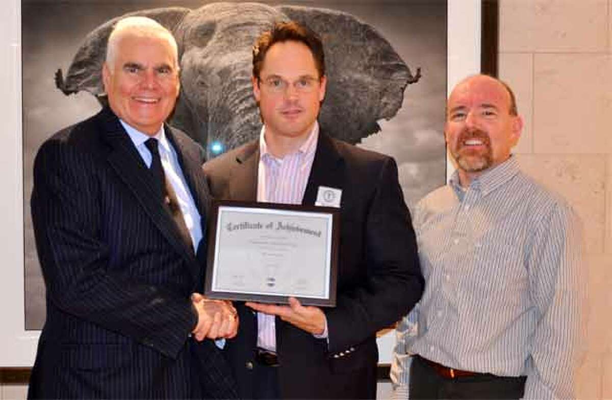 From left are sponsor Robert Scinto of R.D. Scinto Inc., Greg Kazmierczak, president of Toastmasters at the Towers Club, and Andy Bernhardt, club secretary.