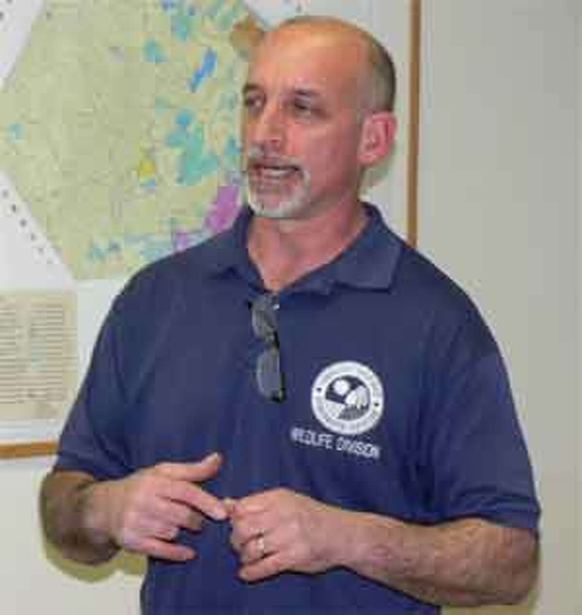 Howard Kilpatrick, a wildlife biologist for the state, discusses how to control the deer population at a Shelton Deer Committee meeting.