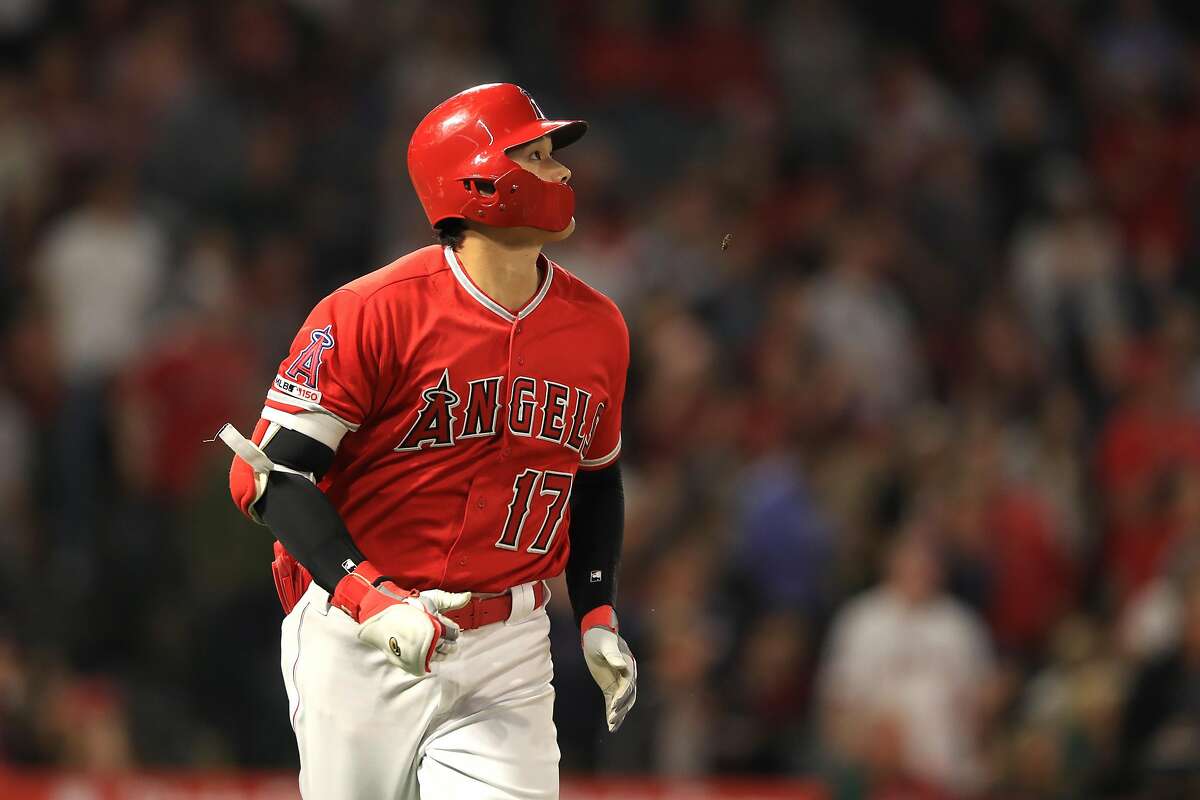 ANAHEIM, CALIFORNIA - JUNE 05: Shohei Ohtani #17 of the Los Angeles Angels of Anaheim runs to first base after hitting three-run homerun during the fourth inning of a game against the Oakland Athletics at Angel Stadium of Anaheim on June 05, 2019 in Anaheim, California. (Photo by Sean M. Haffey/Getty Images)