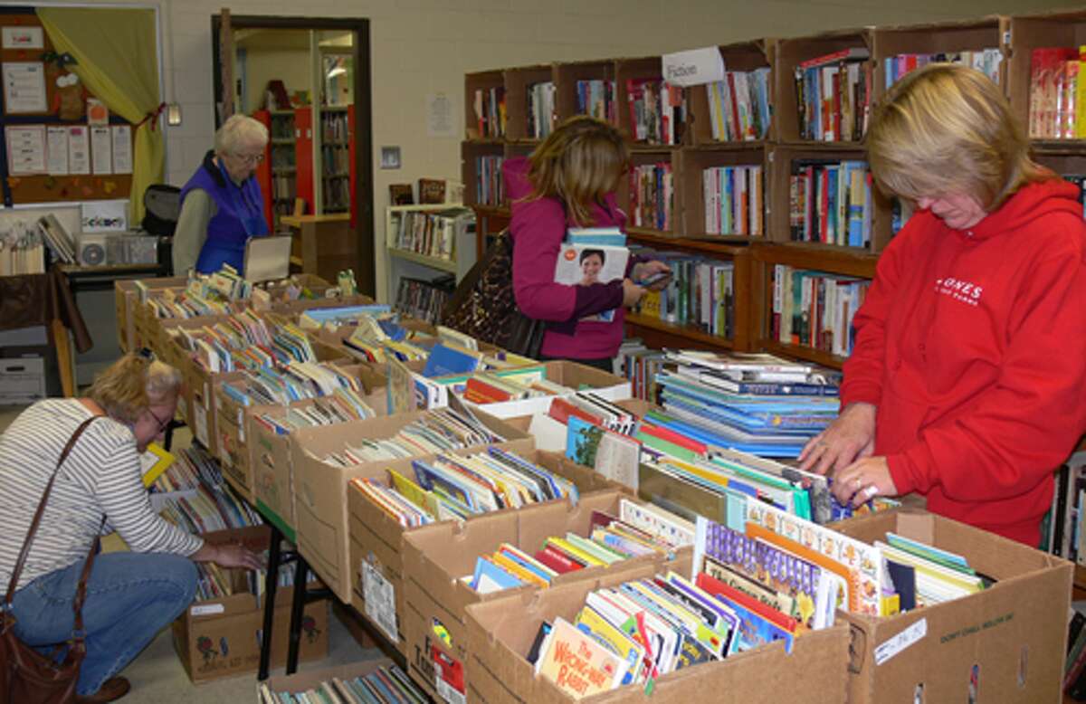 Browsers at the Plumb Memorial Library book sale.